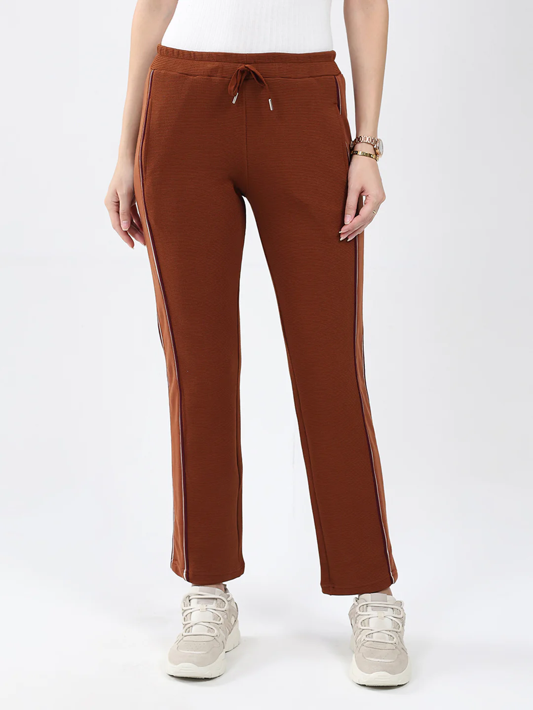 Women Brown Solid Regular Fit Winter Lower